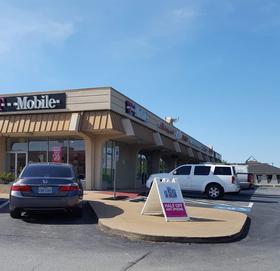 advertising sidewalk sign for promotional event in front of store