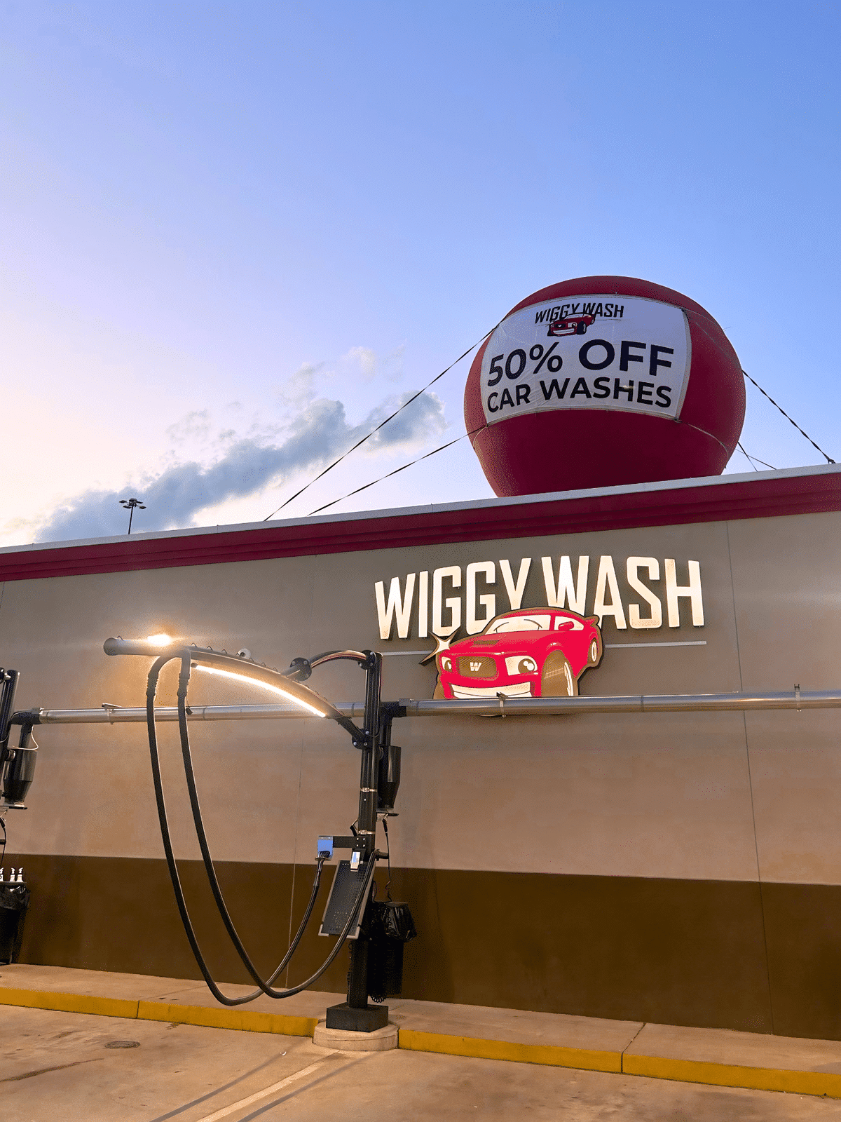 Car wash with sale balloon overhead